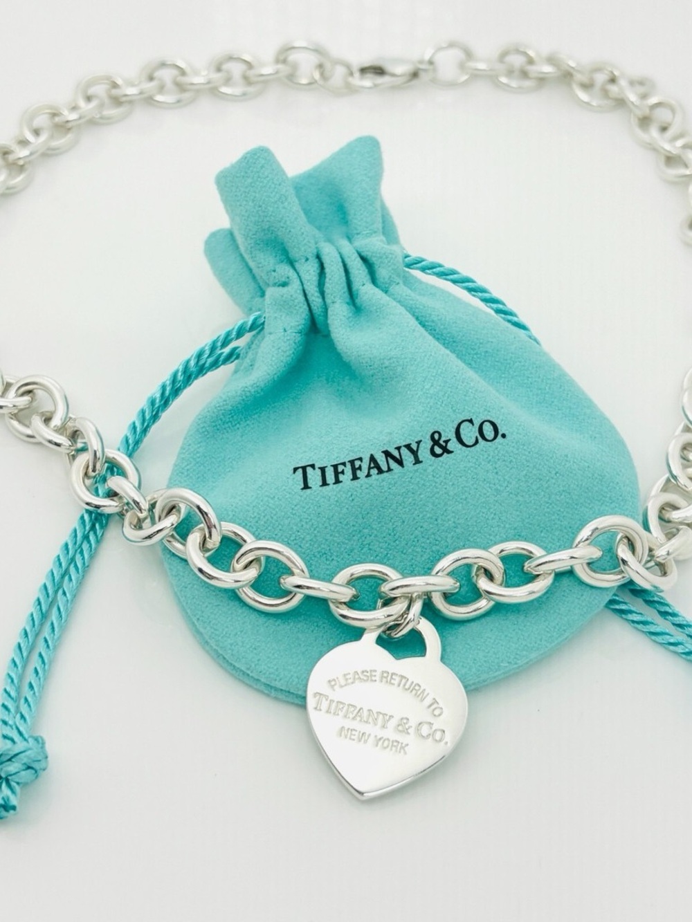 Tiffany & Co. Sterling Silver Heart Tag Necklace with Blue-Green Pouch